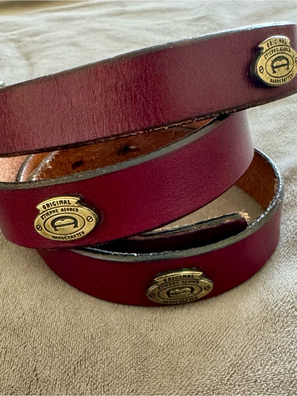 Etienne Aigner Burgundy Leather Belt with Brass Logo Medallions